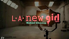 alluring brunette teases body in photoshoot interview sofa