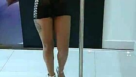 brunette sensually strips lingerie teasing every curve