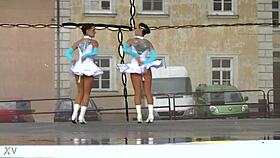 two charming majorettes showcase their energetic cheer skills