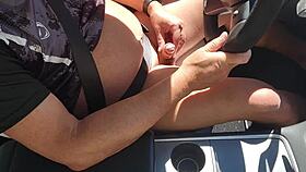 I stroke my cock hard while driving with ass exposed in the car.