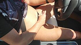 I stroke my cock hard while driving with ass exposed in the car.