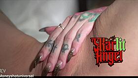 skarlit angel explores her juicy shaved pussy up close