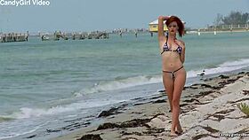 check out hollis ireland's tiny bikini teasing her pussy lips