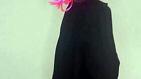 Masked housewife in corset flashes natural tits and dildo on bed