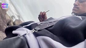 a young stud spots curvy beauty bending on crowded beach