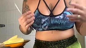 Wifey films cooking but flashes swollen pussy for thrills!