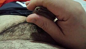 guy strokes cock to explosive cumshot during solo massage