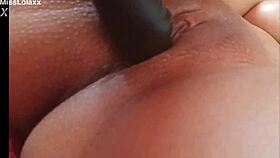 Sensual latina teases her juicy pussy with dildo on bed 😘