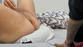 i'm in bed pegging him hard with big strapon quick cum perfect body