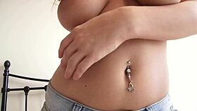 Incredible blonde slowly strips underwear in bedroom revealing big natural tits