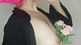 Masked housewife in corset flashes natural tits and dildo on bed