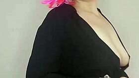 Masked housewife in corset flashes natural tits and dildo on bed