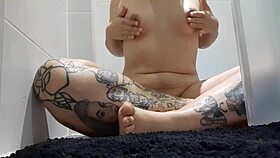 this cute curvy latina milf with tattoos gets horny in lingerie showing natural tits