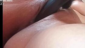 Sensual latina teases her juicy pussy with dildo on bed 😘