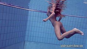 lucy teases by slipping off bikini underwater in pool bath