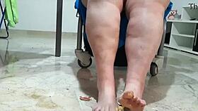 Marina's tired feet massaged with hard eggs on floor!