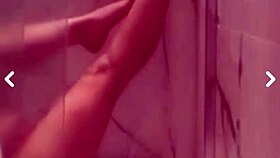 Shaved nympho teases pussy bath flashing for voyeurs