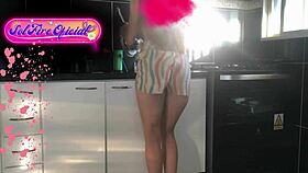 Sol Megan Fire flashes big tits while tidying kitchen as sexy maid