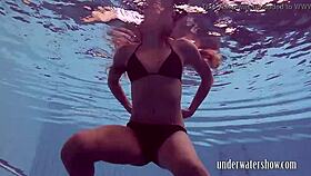 lucy teases by slipping off bikini underwater in pool bath