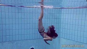 lucy teases by slipping off bikini underwater in pool bath