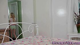 Tiny teen grinds intensely against mature milf's slick folds