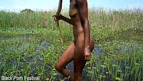 skinny african beauty strokes tourist hard in wild river handjob!