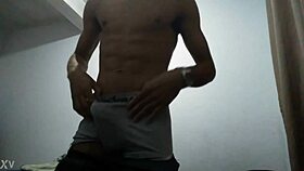 Young stud's thick monster cock throbs hard