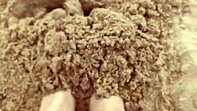 BARE FEET sink into warm sand for sensory fetish play