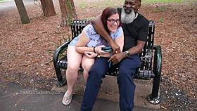 Nerdy milf strokes and sucks big black dick outdoors