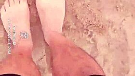 BARE FEET sink into warm sand for sensory fetish play