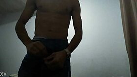 Young stud's thick monster cock throbs hard