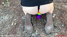 Lebanese babe rubs pussy outdoors riding colorful dildo toy
