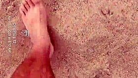 BARE FEET sink into warm sand for sensory fetish play
