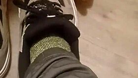 friend enthusiastically trashes sneakers in playful destruction