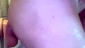 mmm peterwolfe stretches wide with huge pierced shower dildo 💦