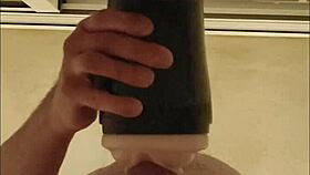 Guy pounds fleshlight shaking orgasm hits
