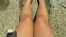Curvy Asian beauty flaunts feet and soles on sunny beach