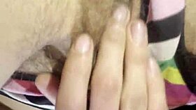 she nervously fingers her hairy wet pussy for the very first time on cam
