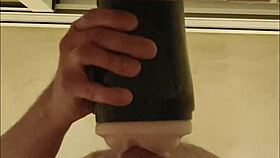 Guy pounds fleshlight shaking orgasm hits