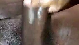 Tattooed babe screams in orgasm stroking massive black cock to cumshot explosion