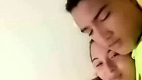 Intimate Bedroom Encounter Between Passionate Couple