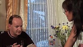 mature asian housewife spreads wide on the desk for homemade fun