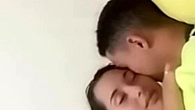 Intimate Bedroom Encounter Between Passionate Couple