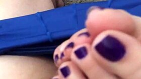 Seductive footjob highlights vibrant purple toes