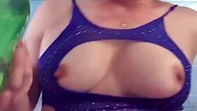 check out this milf's huge throbbing clit