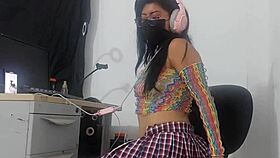 Pretty girl in miniskirt fishnets rides huge horse dildo