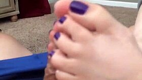 Seductive footjob highlights vibrant purple toes