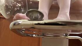 Brunette Talia Soaks Stockings Wet Solo