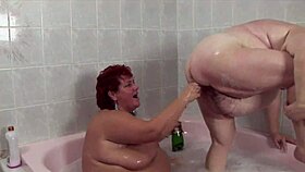 red twins shove heel and bubbly bottle deep! 👠🍾