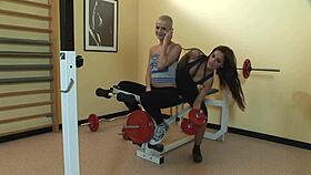 Lesbian trainer licks wet pussies and asses of two sluts at the gym